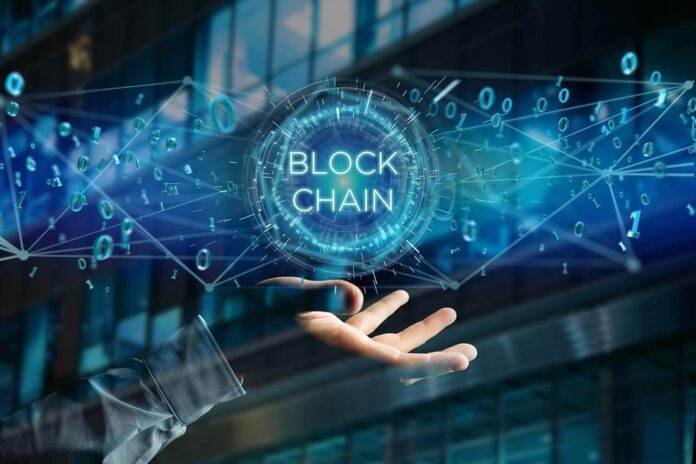 A diverse group of professionals engaged in a lively discussion about the transformative potential of blockchain technology in revolutionizing industries.