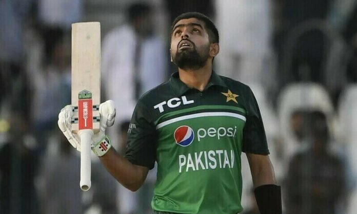 Babar Azam celebrating his record-breaking achievement on the cricket field.