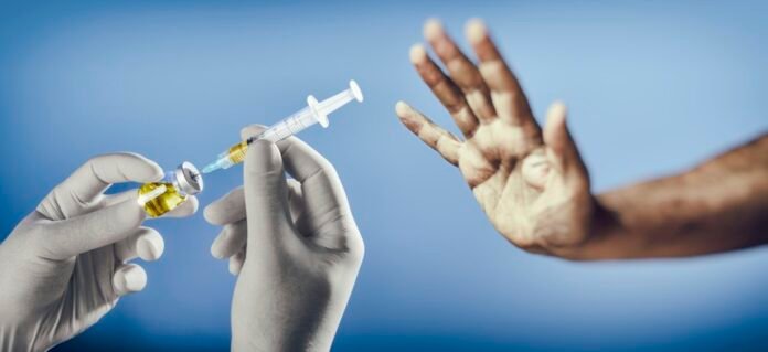 Covid vaccination campaigns are undermined by lawmakers in Texas and Florida